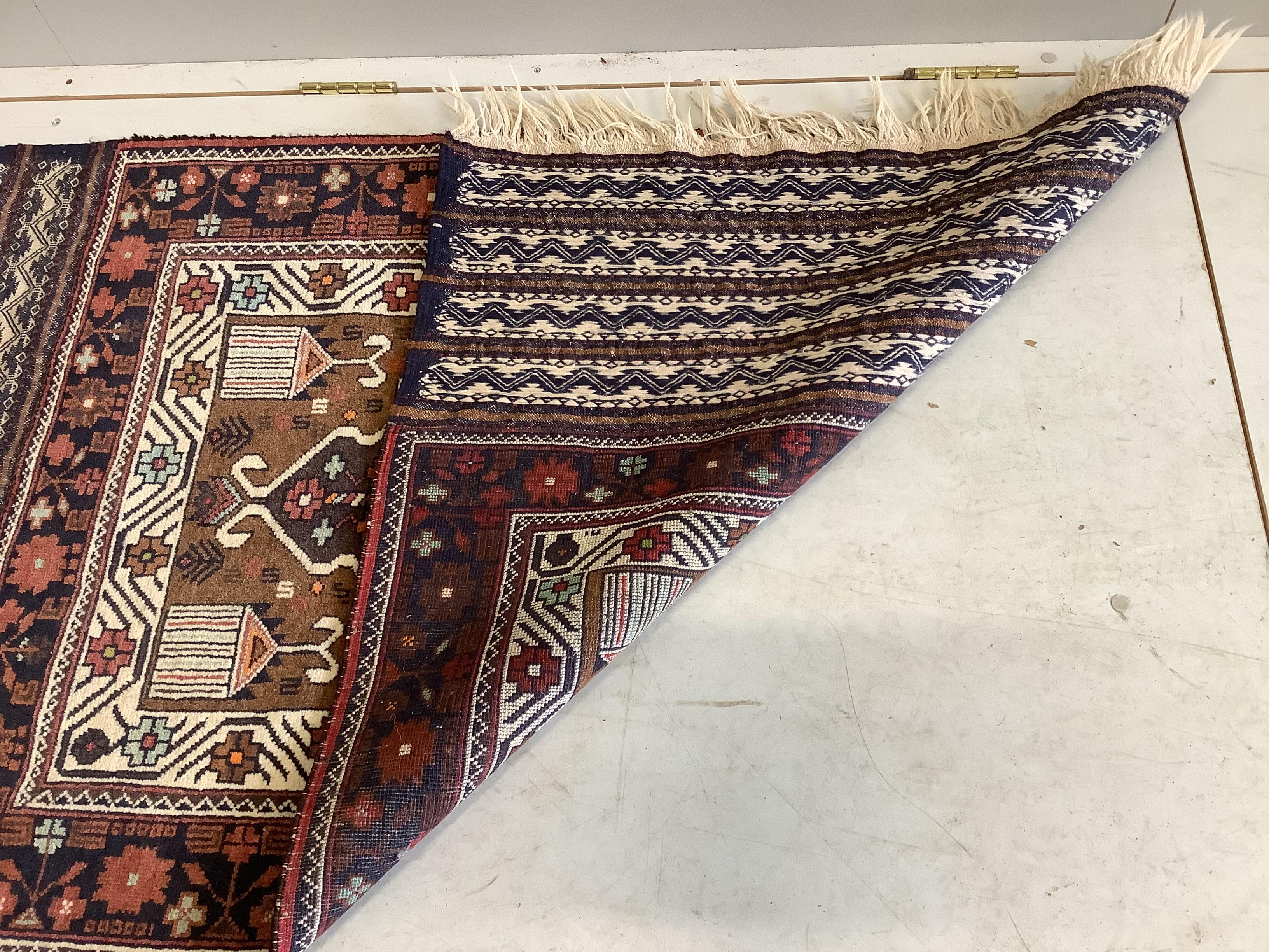 A Turkish polychrome geometric rug, 150 x 85cm